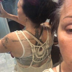 NWT cream sleeveless sweater with web back